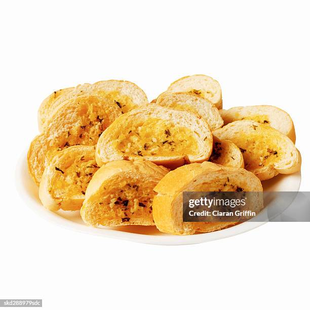 close-up of a dish of garlic bread - garlic bread stock pictures, royalty-free photos & images