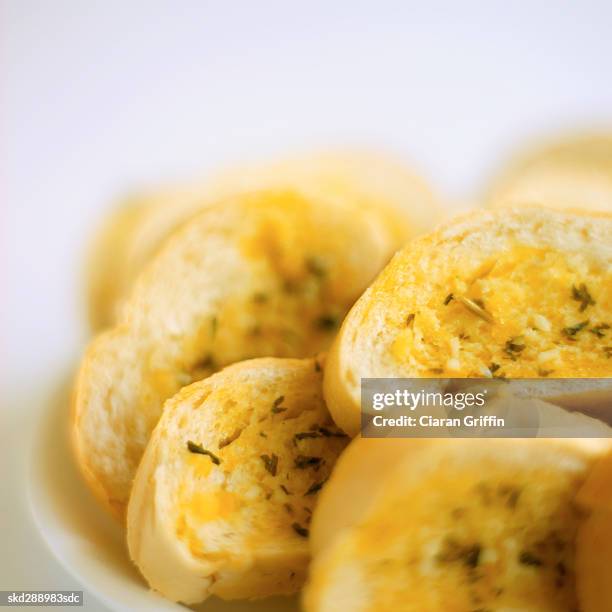 close-up of a dish of garlic bread - garlic bread stock pictures, royalty-free photos & images