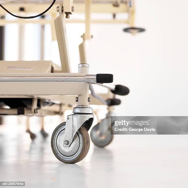 close-up of the wheels of a gurney - stretcher photos et images de collection