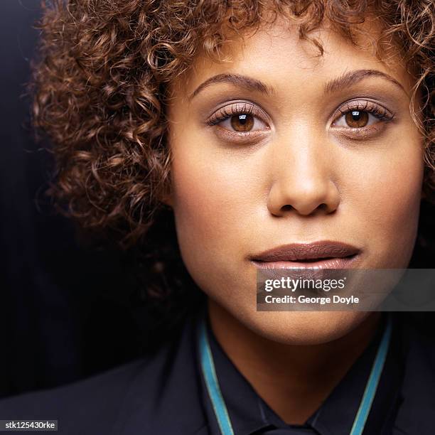 close-up of a young businesswoman's face - george aloof stock pictures, royalty-free photos & images