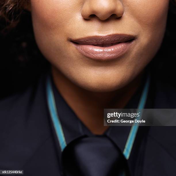 close-up of a young businesswoman's smile - man smile stock-fotos und bilder