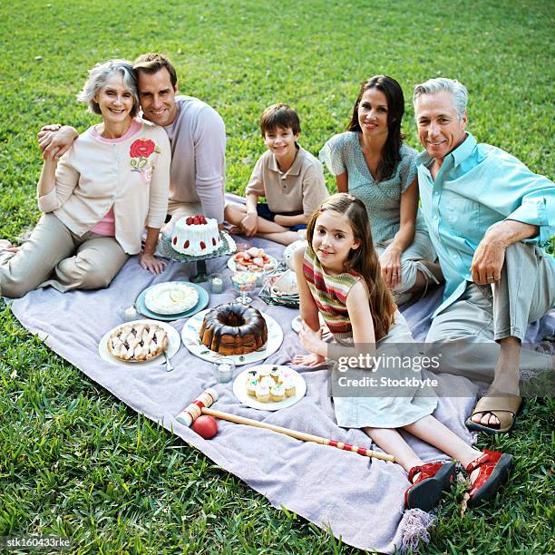 portrait of a family having party in a garden - national youth theatre 60th anniversary gala the story of our youth at 60 stockfoto's en -beelden