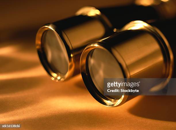 close-up of the lenses of binoculars - ツール ストックフォトと画像