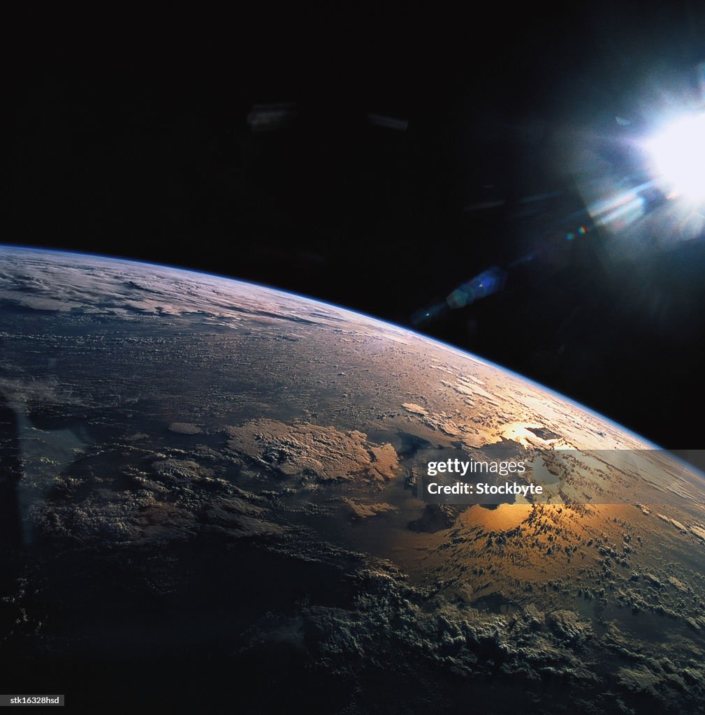 View from space of the suns rays falling on earth