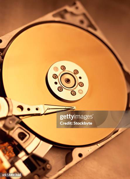 close-up of a hard disk drive for a computer - ツール ストックフォトと画像