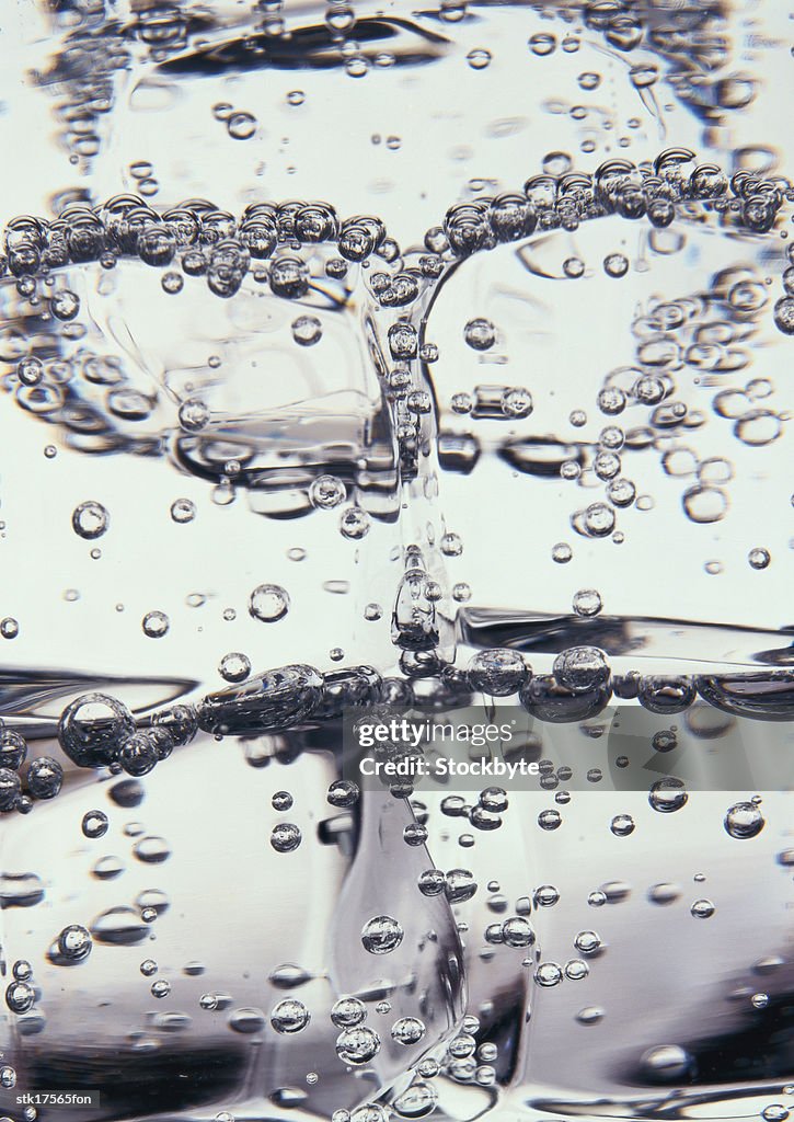 Bubbles in a glass of liquid