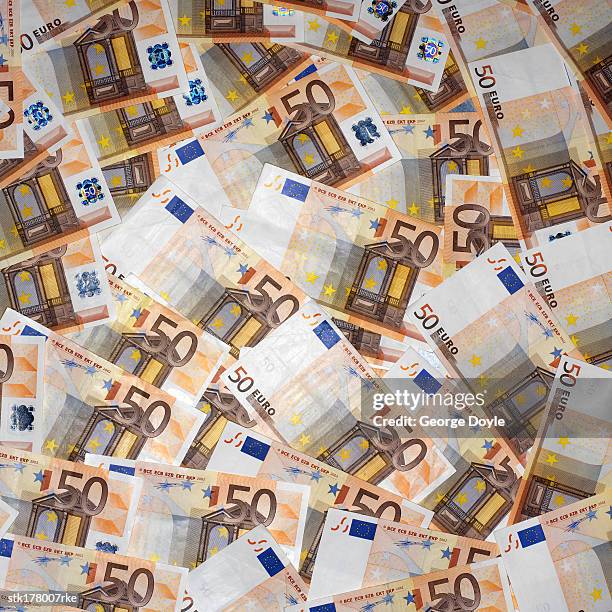 an array of fifty euro bills - beed stock pictures, royalty-free photos & images