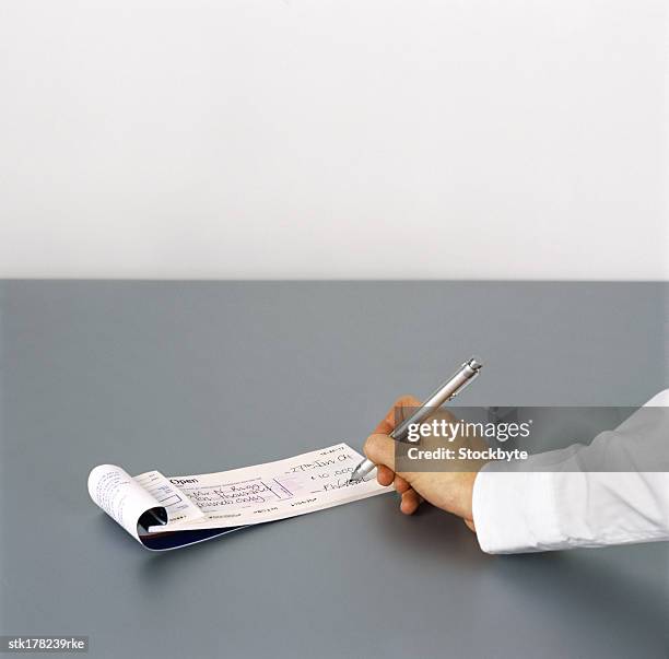 Sign Cheque Sign Cheque Book Photos and Premium High Res Pictures - Getty Images