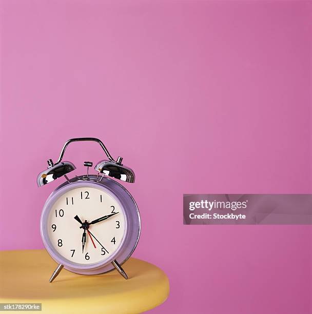 close-up of an alarm clock on a table - olivia wilde co hosts event at birchbox soho in celebration of conscious commerce birchbox collaboration stockfoto's en -beelden