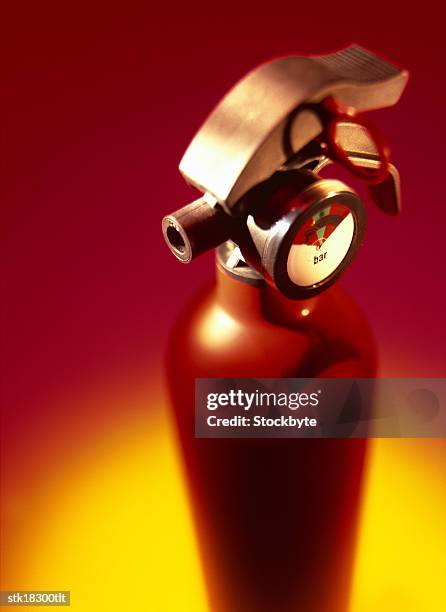 shot of a fire extinguisher - noodapparatuur stockfoto's en -beelden