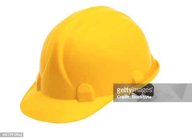 close-up of a construction hard hat - hat stock-fotos und bilder