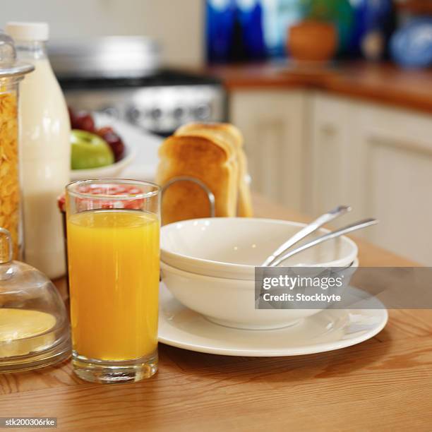 close up view of breakfast items on kitchen counter - close up counter ストックフォトと画像