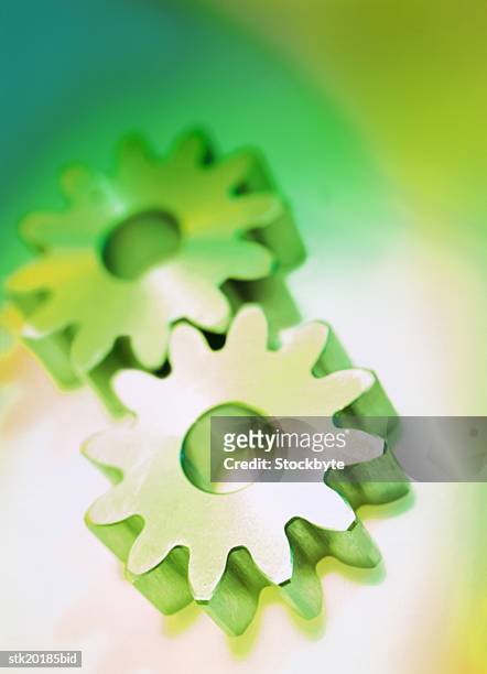 toned high angle view of two gear wheels - vehicle breakdown ストックフォトと画像