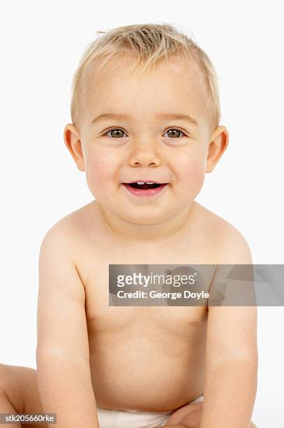 close up portrait of a baby (12-18 months) laughing - only baby boys stock pictures, royalty-free photos & images