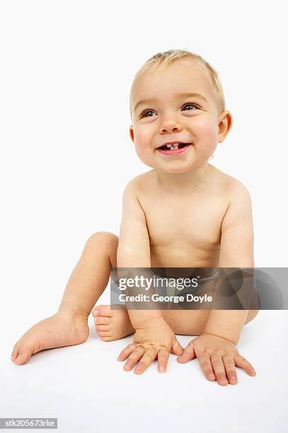 close up view of a baby (12-18 months) laughing - one baby boy only stock pictures, royalty-free photos & images