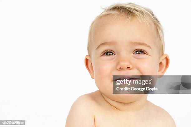 close up portrait of a baby (12-18 months) laughing - only baby boys stock pictures, royalty-free photos & images