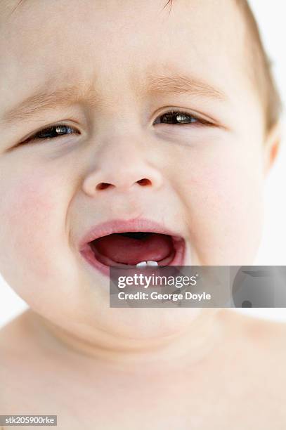 close up portrait of a baby (12-18 months) crying - only baby boys stock pictures, royalty-free photos & images