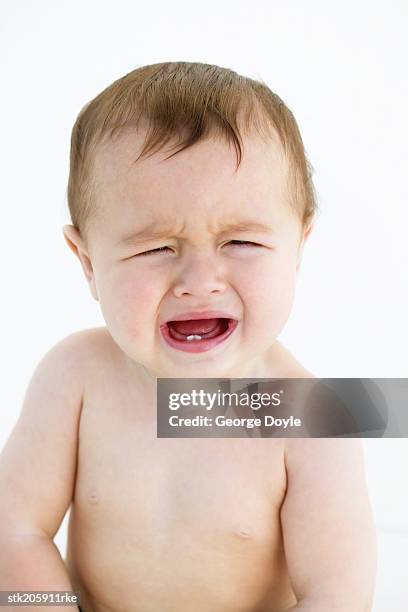 close up view of a baby (12-18 months) crying - only baby boys stock pictures, royalty-free photos & images