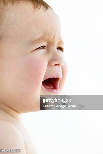 close up view of a baby (12-18 months) crying - only baby boys stock pictures, royalty-free photos & images