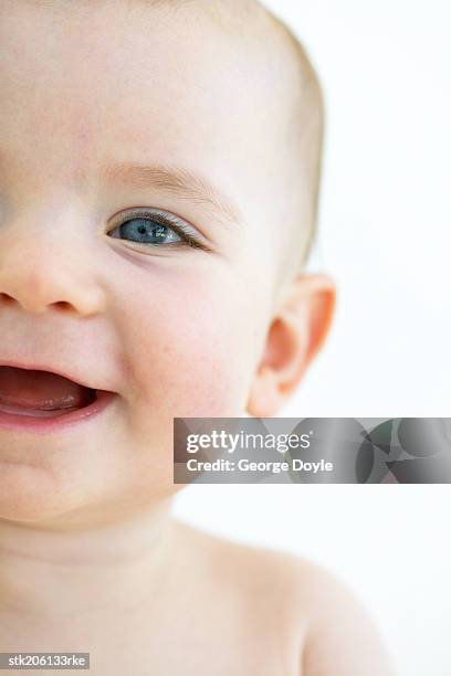 close up of a baby (12-18 months) smiling - only baby girls stock pictures, royalty-free photos & images