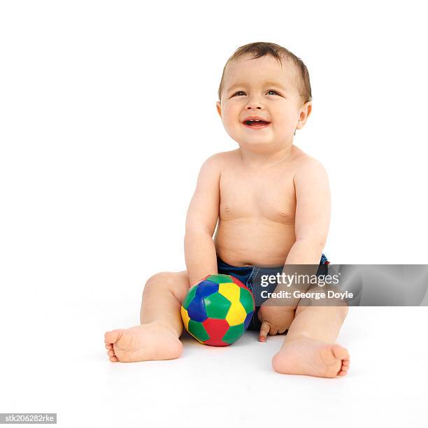 baby (12-18 months) playing with a toy - only baby boys stock pictures, royalty-free photos & images