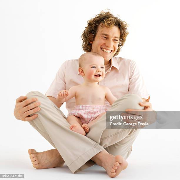 father spending time with his baby (12-18 months) - genderblend stock-fotos und bilder