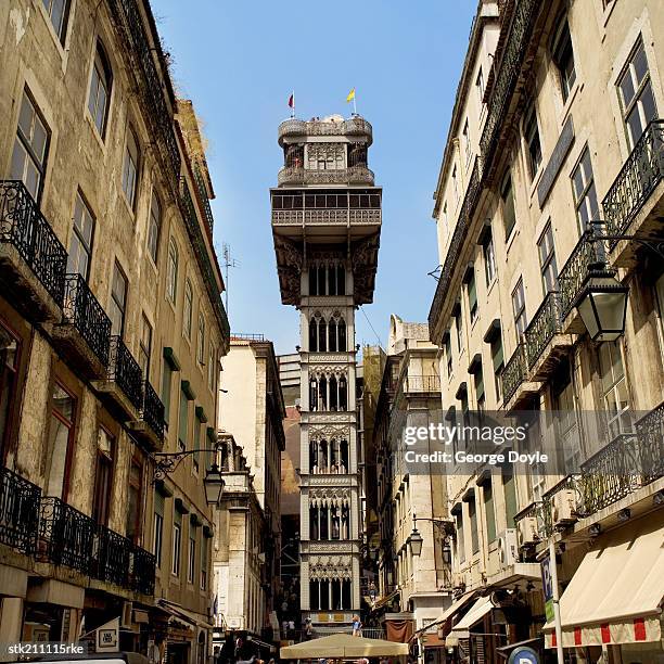 low angle view of eiffel elevator, lisbon, portugal - lisbon stock-fotos und bilder