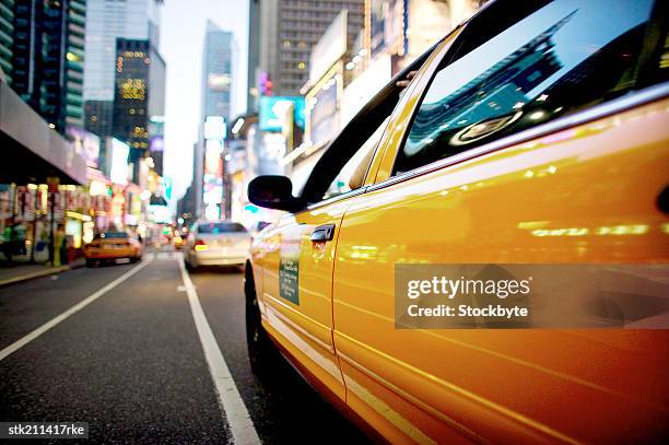 close up nighttime view of times square, new york city - upper midtown manhattan stock pictures, royalty-free photos & images