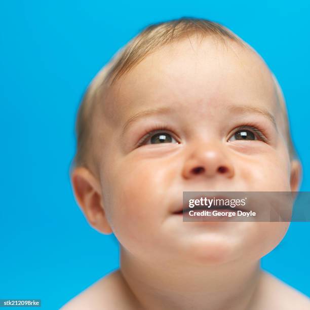 close up view of a baby girl (6-12 months) smiling - only baby boys stock pictures, royalty-free photos & images