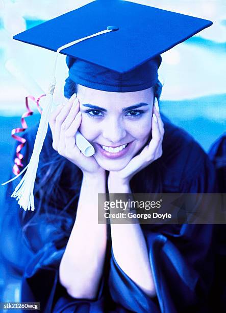 portrait you a young woman in a graduation hat - hat stock-fotos und bilder