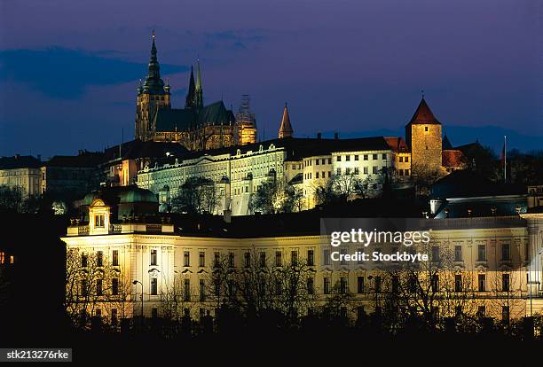 st. vitus cathedral and prague castle and the government buildings illuminating prague, czech republic - republic of ireland training and press conference group c uefa euro 2012 stockfoto's en -beelden