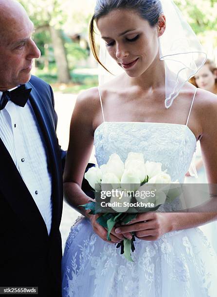 portrait of a bride standing with her father - bride father stock pictures, royalty-free photos & images