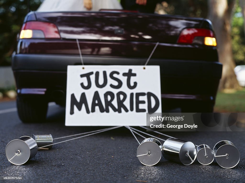 Back of a car with a just married sign