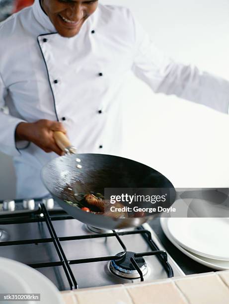 chef cooking food in the kitchen - gen z studio brats premiere of chicken girls arrivals stockfoto's en -beelden