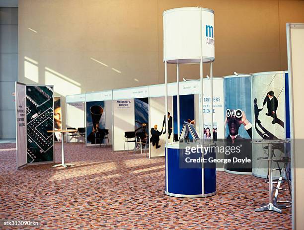 booths at an exhibition - tradeshow stock pictures, royalty-free photos & images