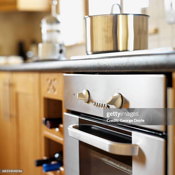 utensil on a burner in the kitchen - the kitchen bildbanksfoton och bilder