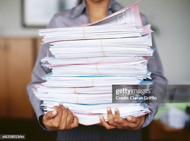 Running Paper Stack 1,541 Holding Stack Of Papers Stock Photos, High-Res Pictures, and ...