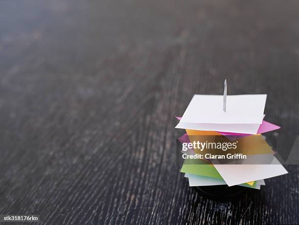 close-up of receipts on a spike in an office - informational stock pictures, royalty-free photos & images