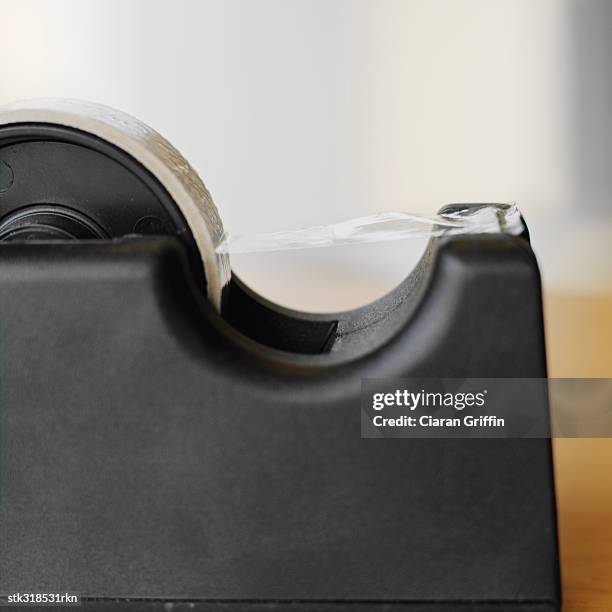 close-up of a tape dispenser - tape dispenser stock pictures, royalty-free photos & images