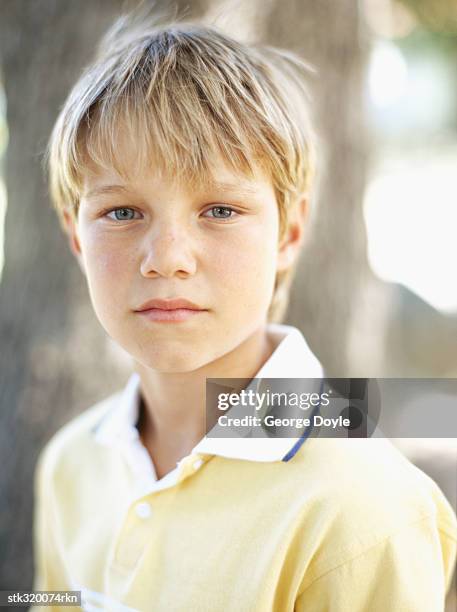portrait of a boy - ojos grises fotografías e imágenes de stock