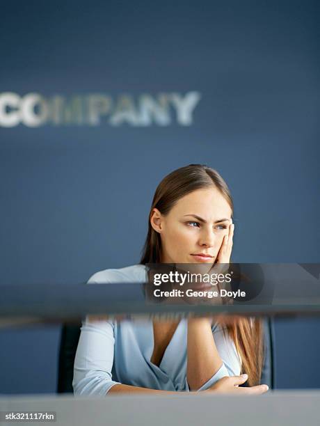 businesswoman day dreaming in an office - and haryana police joint mock drill ahead of republic day stockfoto's en -beelden