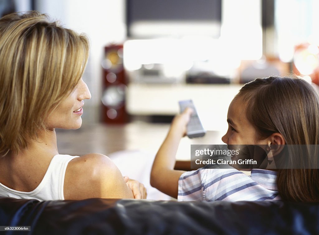 Rear view of a mother looking at her daughter