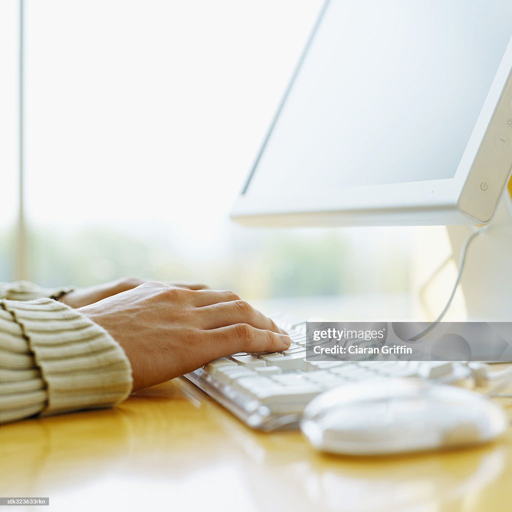 Close-up of a person using a computer
