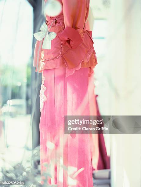 dress on a mannequin - retail equipment stock pictures, royalty-free photos & images