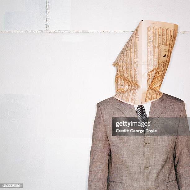 portrait of a businessman with face covered in newspaper - olivia wilde co hosts event at birchbox soho in celebration of conscious commerce birchbox collaboration stockfoto's en -beelden