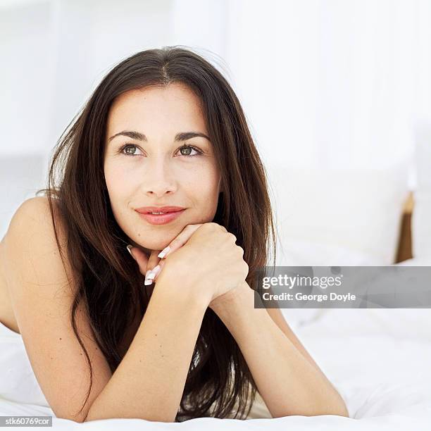 a happy woman in contemplation - happy stockfoto's en -beelden