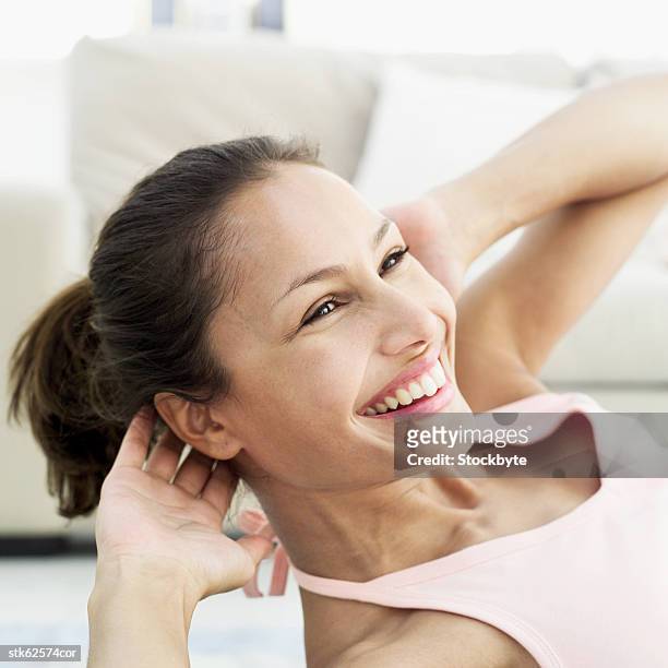 close-up of a woman doing sit-ups - duing stock pictures, royalty-free photos & images