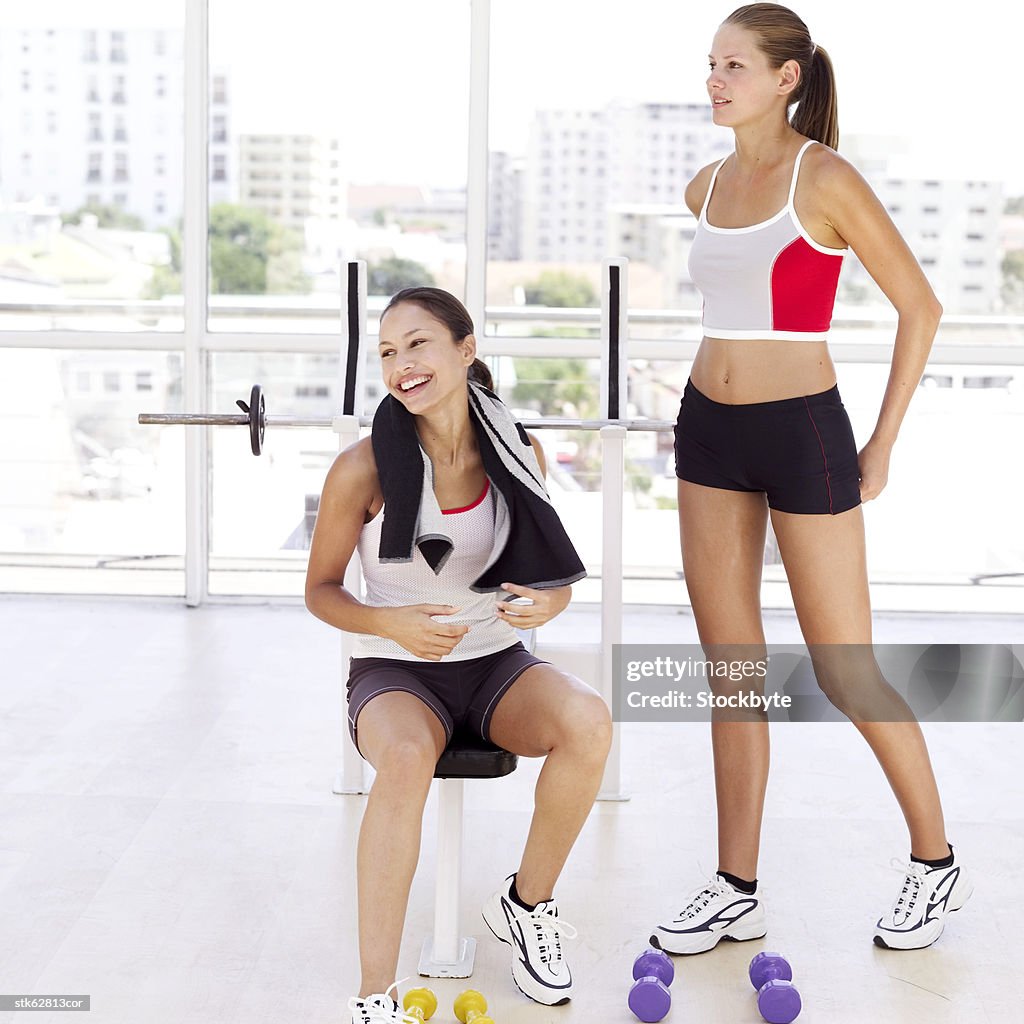 Portrait of two young women exercising
