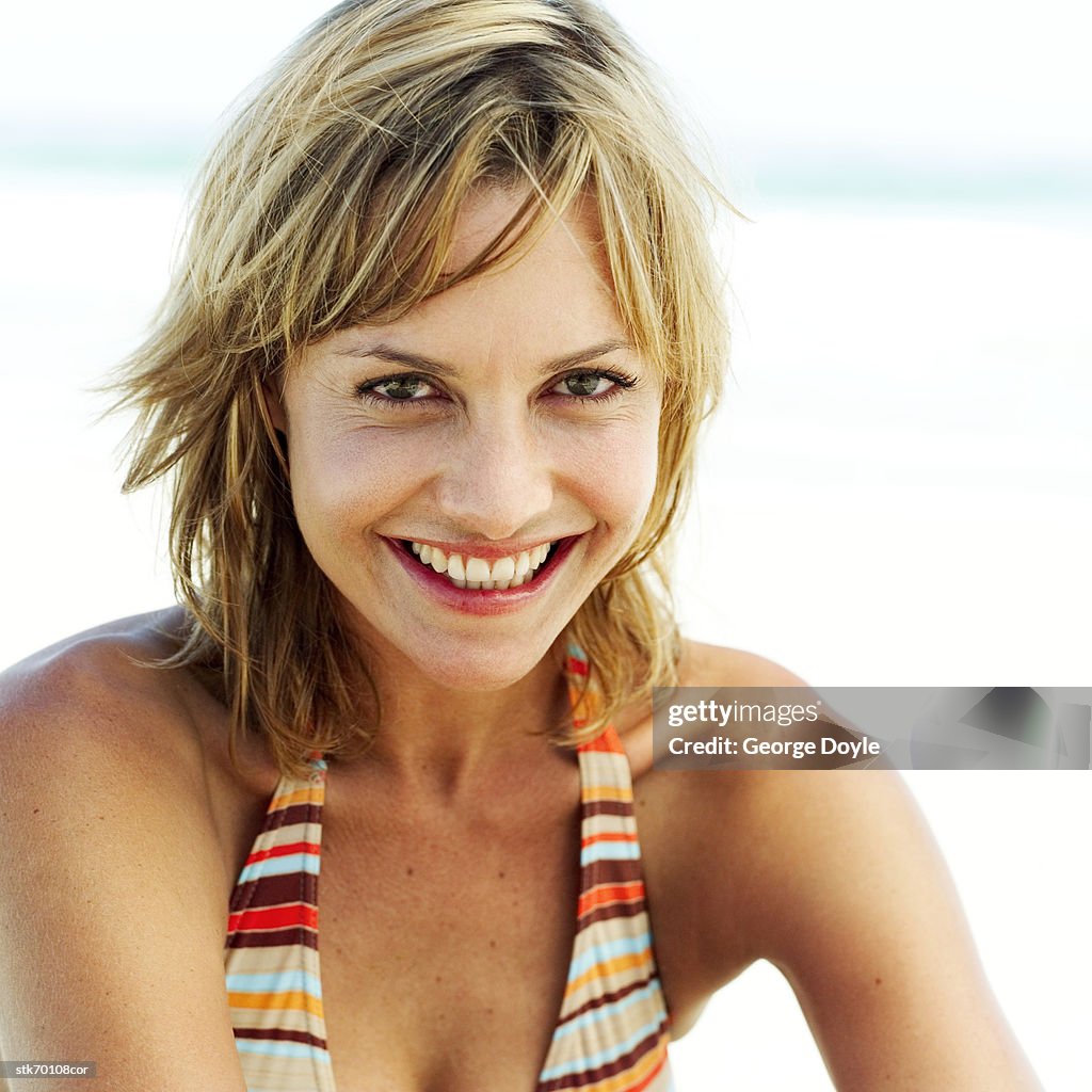 Portrait of a girl smiling in a swim suit
