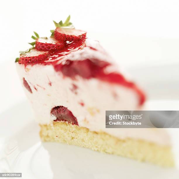 close-up of a slice of strawberry cake - slice stock pictures, royalty-free photos & images